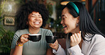 People, friends and laughing with coffee at cafe for funny joke, discussion or break together. Happy group smile enjoying fun conversation with beverage, croissant or cup of tea at indoor restaurant