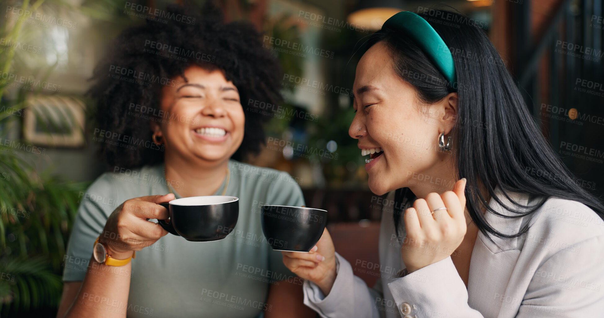 Buy stock photo People, friends and laughing with coffee at cafe for funny joke, discussion or break together. Happy group smile enjoying fun conversation with beverage, croissant or cup of tea at indoor restaurant