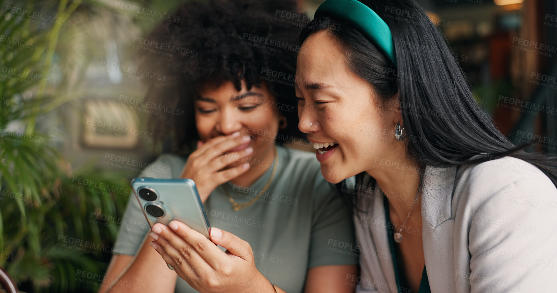 Buy stock photo Happy women, friends and phone for social media at coffee shop for news, gossip or networking together. Young people smile and laughing on mobile smartphone for funny joke or meme at cafe restaurant