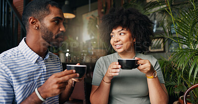Friends, cheers and coffee in restaurant with talking, bonding together and relax on break on vacation. Young man, woman and communication by tea, happiness and care for cappuccino on holiday in cafe