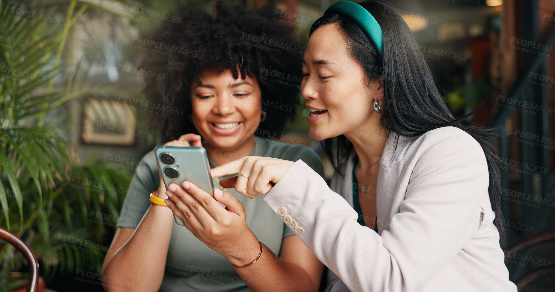 Buy stock photo Friends, smartphone and talking in restaurant with scroll, social media and together for relax break on vacation. Young people, phone and check post with networking, happiness and connected in cafe