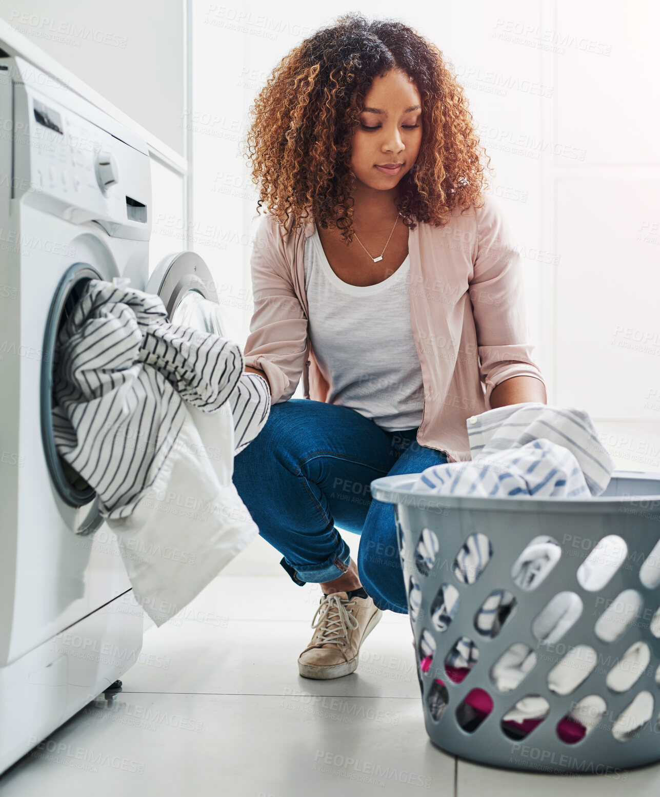 Buy stock photo Laundry, basket and woman with load by washing machine for housekeeping, maintenance and hygiene. Thinking, female person and appliance with fabric at home for cleanIng, chores and removal of stains