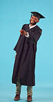 College student, pointing and graduation space in studio for future scholarship. Portrait, advertising and unsure black male show marketing for university choice, doubt or decision on blue background