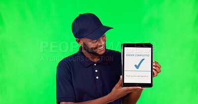 Tablet, delivery and complete with a black man on a green screen background in studio for distribution. Technology, supply chain logistics and order with a young male courier on chromakey mockup