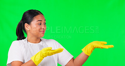 Cleaning, presentation and pointing with woman on green screen for idea, choice and decision. Advertising, hygiene and show with portrait of person on studio background for offer, opinion and mockup
