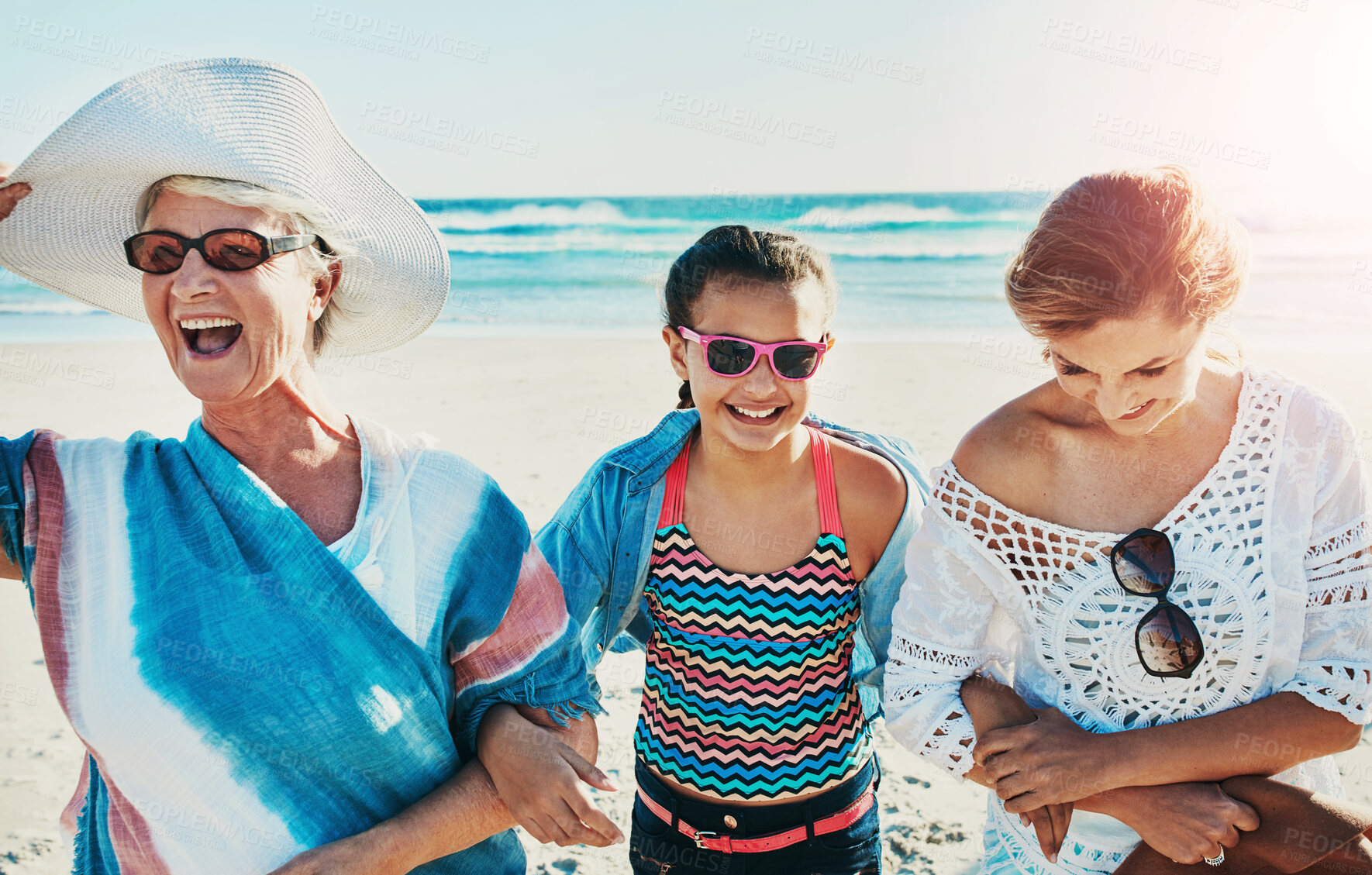 Buy stock photo Grandma, daughter and girl in beach with smile for fun on summer holiday or vacation and break. Family, senior woman and happy or excited with kid in ocean for bonding, love and support for memories