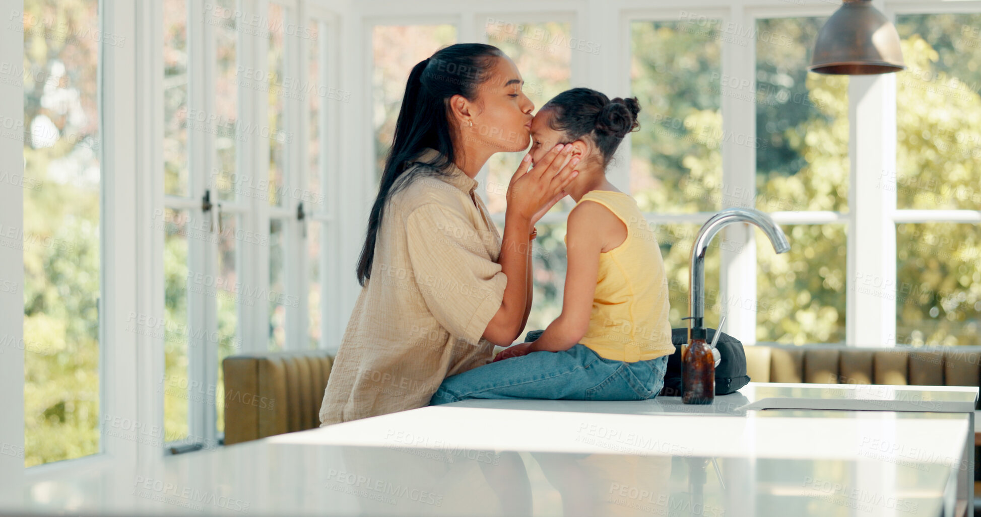 Buy stock photo Kiss, mother and daughter with getting ready in home on kitchen table with backpack and greeting. Morning, girl child and mom with prepare for education, learning and kindergarten with love and care