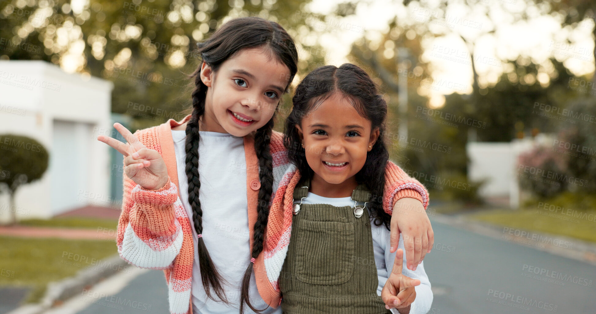 Buy stock photo Relax, face and children with peace sign outdoor on summer break with smile from bonding, love and support. Portrait, emoji hand sign and siblings with fun and girl playing in road on school holiday