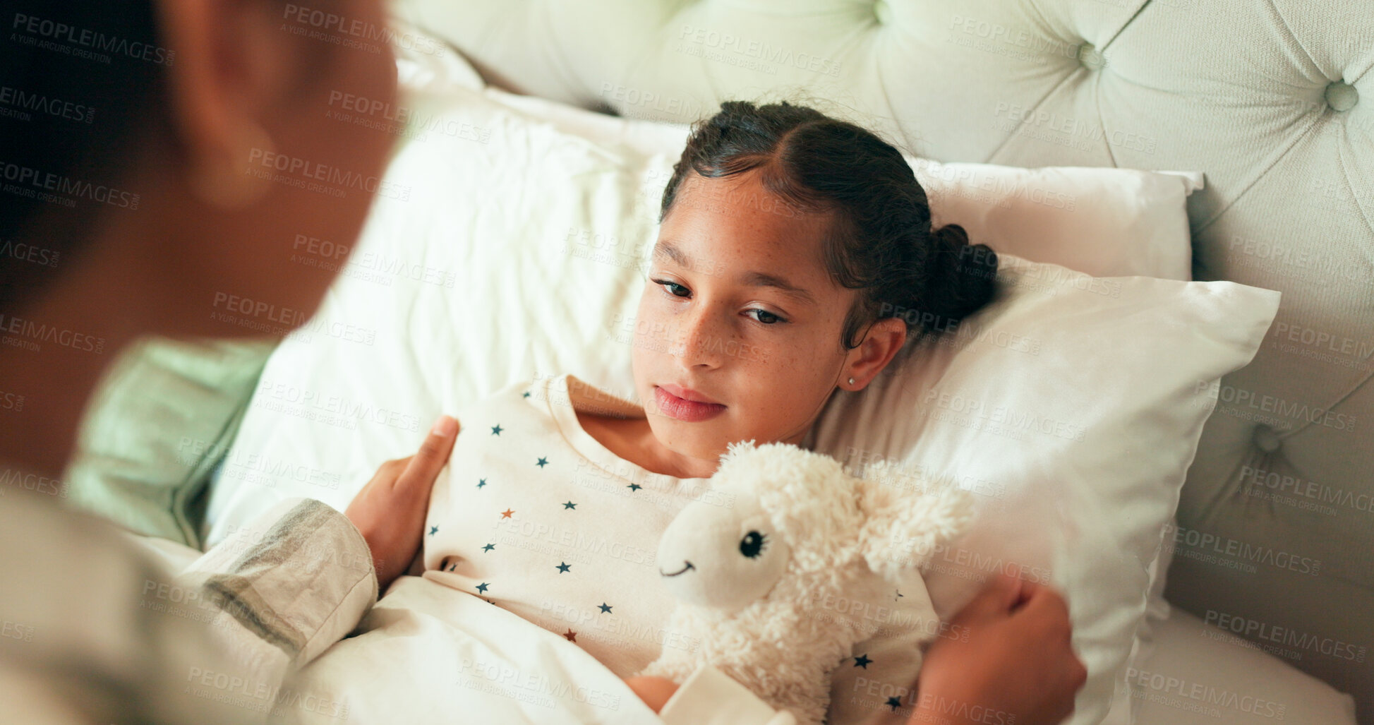 Buy stock photo Girl, mother and sick on bed in home with fever, worry and parenting to monitor symptoms with teddy. Child, ill and bedroom with parent, concern and touching body for diagnosis, support and care