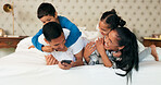 Mother, father and happy kids on bed, playing and bonding fun in family home on weekend morning. Happiness, parents and children smile in bedroom, playful quality time together and laughing with love