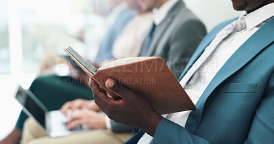 Businessman, hands and writing with book in row for notes, presentation or waiting room at the office. Closeup of man or employee filling notebook in line for schedule or attention at the workplace