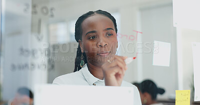 Writing, glass and business woman with notes for planning, brainstorming ideas and problem solving. Corporate, consultant and person write on window for project, research and schedule in office