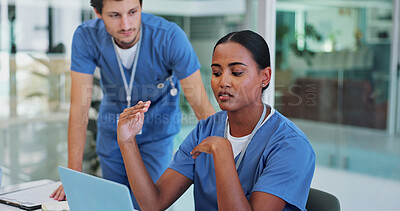 Nurse, talking and teamwork with laptop for medical solution, brainstorming and problem solving in residency training. Healthcare worker, student or people on computer with support and explaining
