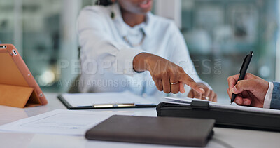 Business people, hands and closeup at meeting with paperwork for proposal, deal or negotiation with tech. Group, team or b2b collaboration for creative agency in legal consultation with documentation