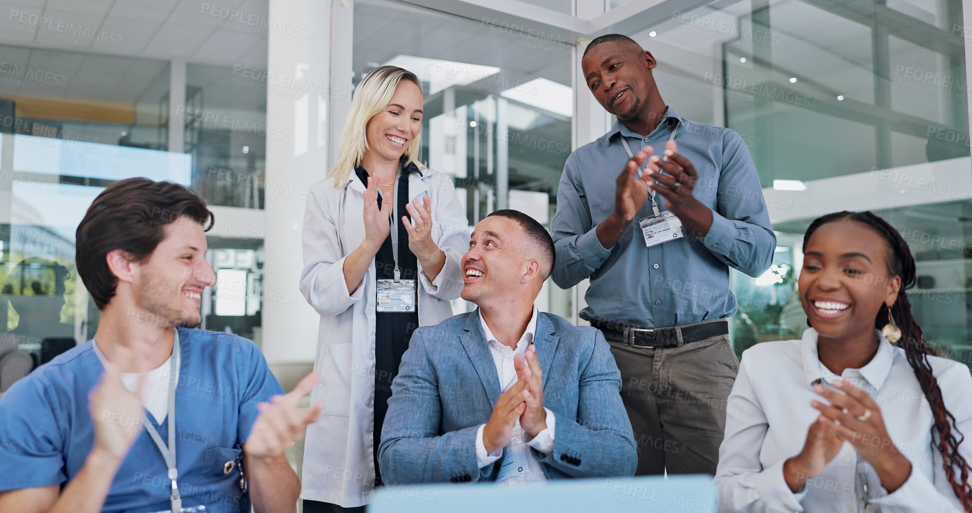 Buy stock photo Doctor, team and clapping hands for celebration in meeting for medical breakthrough and healthcare discovery. Medicine staff, nurse and people with applause, happy and diversity in conference room