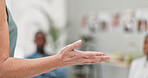 Woman, hands and presentation with team for meeting, staff training or coaching at office. Closeup of female person, spokesperson or presenter talking to group or employees for discussion or speech