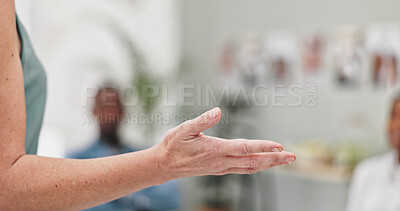 Woman, hands and presentation with team for meeting, staff training or coaching at office. Closeup of female person, spokesperson or presenter talking to group or employees for discussion or speech