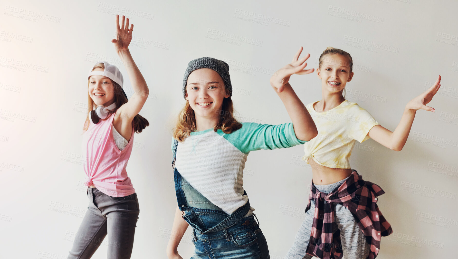 Buy stock photo Happy girl, portrait and friends dancing with fashion for vlog, trend or social media on a white studio background. Group of young children, kids or teens with smile or moves in cool clothing style