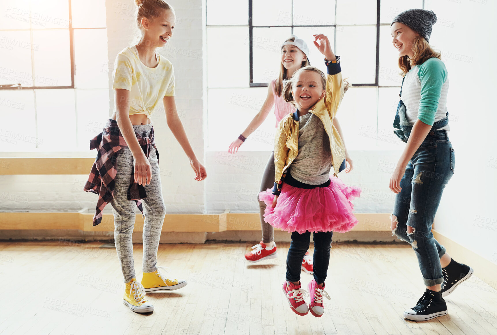 Buy stock photo Dancing, fun and group of children in studio for hip hop rehearsal for concert show with music. Friends, rhythm and girl kids from Canada with groove routine for recital or performance at art school.