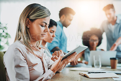 Buy stock photo Shot of young designers working in a modern office