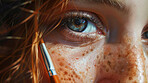 Woman, eyes and closeup of freckles with makeup for beauty, skincare and cosmetics brush with glowing skin. Melasma, girl and facial zoom with cosmetology, eyelashes and microblading for self care