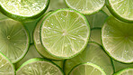 Lime, fruit and wallpaper with citrus vitamin for immune boost benefits, fiber or lose weight. Health, wellness and background or organic food with raw juice for detox diet, antioxidants or nutrition