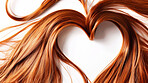 Love, ginger hair in shape of heart with charity, support and donation for cancer foundation on white background. Haircut, strand and smooth texture with symbol for hope, kindness and shine on wig