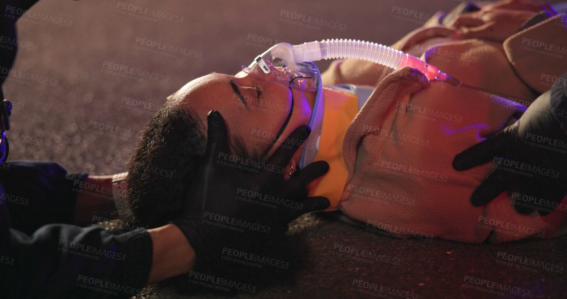 Buy stock photo Accident, patient and neck brace on face in emergency, night and paramedic for medical service. Victim, closeup and saving or rescue from disaster, first aid and cpr and oxygen mask for drunk driving