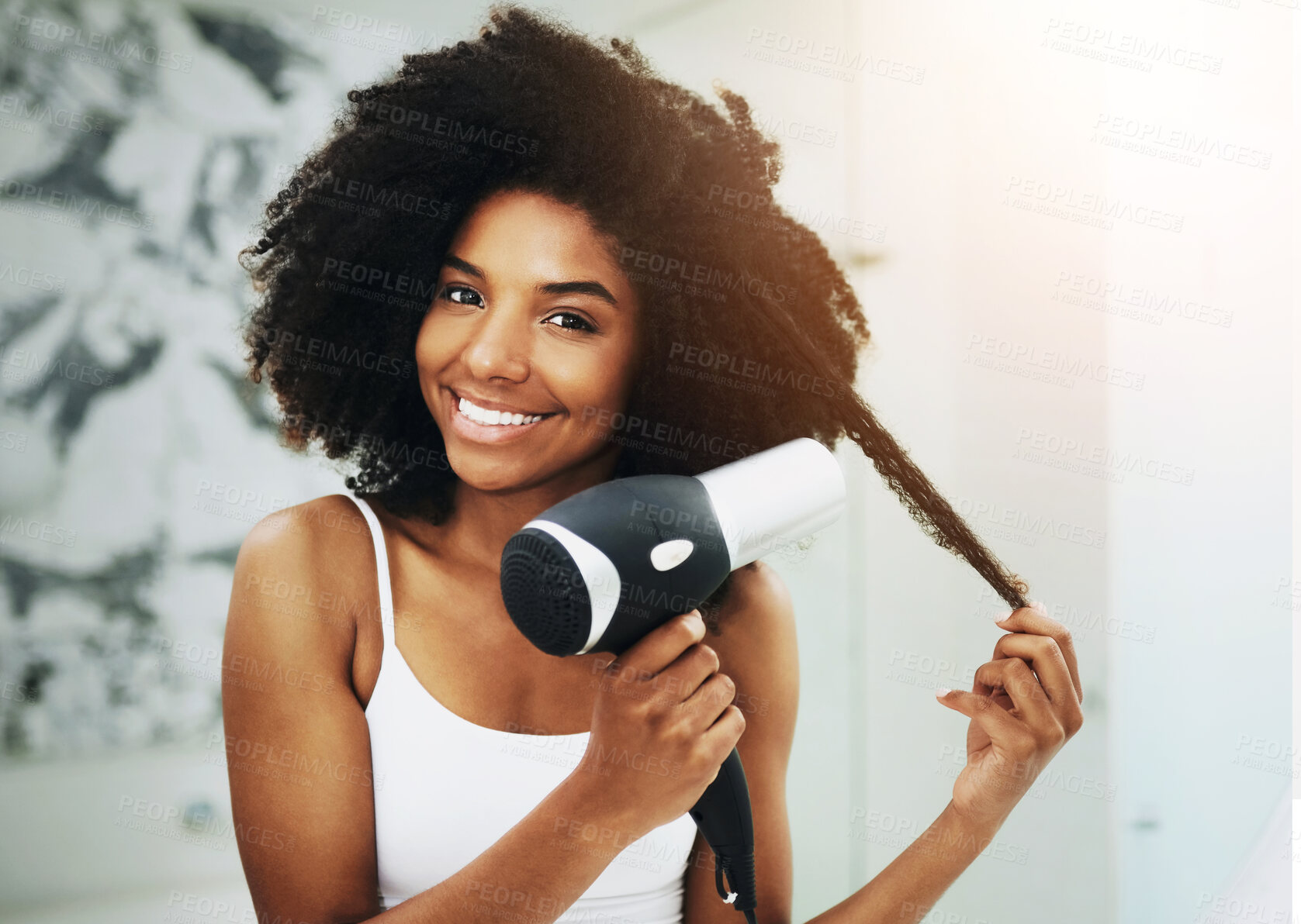 Buy stock photo Hair care, afro and portrait of black woman with dryer, happy and pride for growth in bathroom. Gen z girl, hairstyle and routine clean at home for beauty, luxury product and cleaning in morning