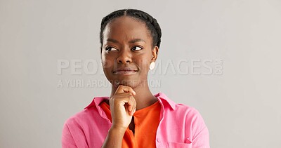 Buy stock photo Smile, thinking and black woman in studio with idea, solution or insight expression on grey background. Why, face and female model with brainstorming emoji for choice, opinion or solution decision