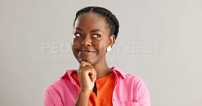 Buy stock photo Smile, thinking and black woman in studio with idea, solution or insight expression on grey background. Why, face and female model with brainstorming emoji for choice, opinion or solution decision