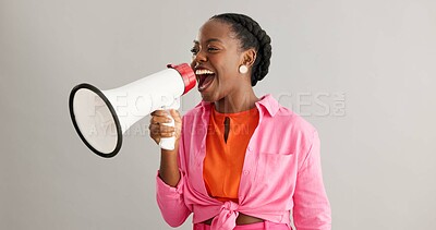 Buy stock photo Megaphone, excited and black woman on gray background for news, announcement and information. Bullhorn, communication and person with speaker for discount, sale and bargain broadcast in studio