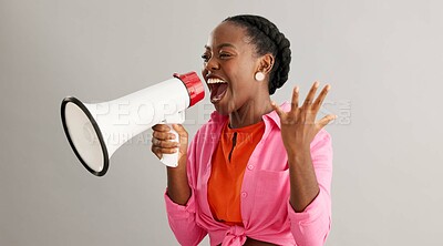 Buy stock photo Megaphone, shout and excited black woman on gray background for news, announcement and information. Bullhorn, communication and person with speaker for discount, sale and bargain broadcast in studio