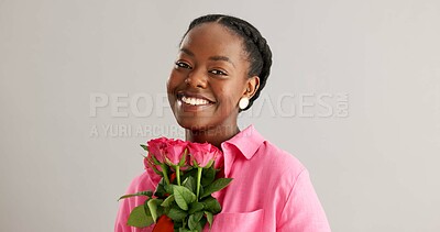 Buy stock photo Woman, happy and pink flowers in studio for gift, kindness and gratitude with scent or fragrance on a white background. Face of an African person or model with bouquet of roses for valentines day