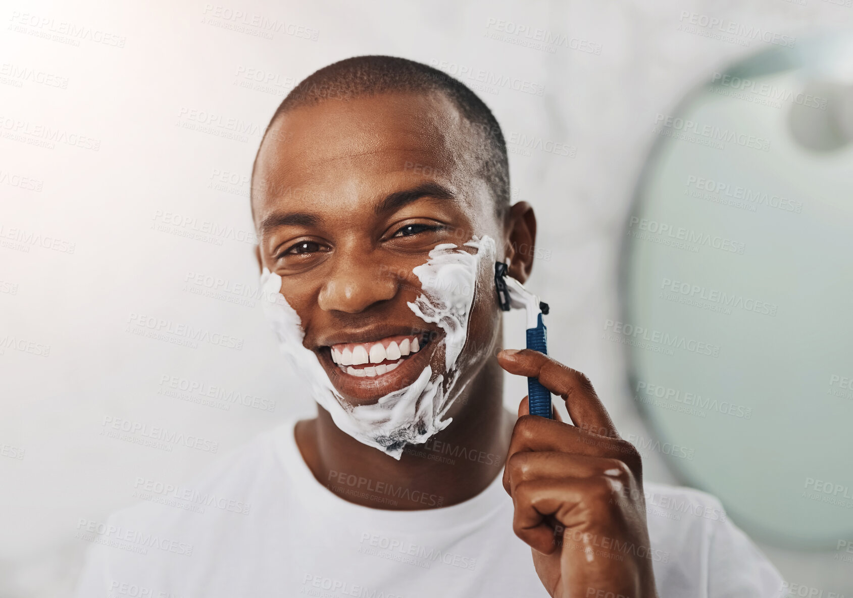 Buy stock photo Shave, portrait of black man and smile in morning for skincare, hair removal and grooming in bathroom. Male person, epilation and routine for smooth skin with razor, foam and facial treatment at home