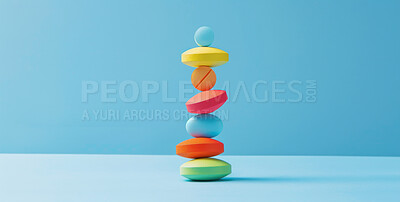 Medicine, healthcare and stack of pills in studio for life extension drugs, healing or recovery. Color, medical and line of tablets or medication for weightloss by blue background with mockup space.