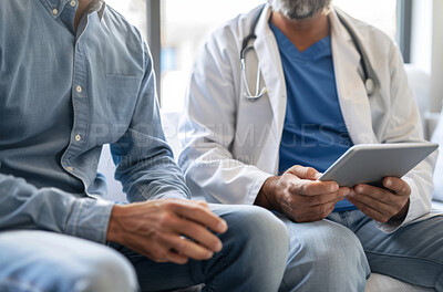 Buy stock photo Hands, tablet and doctor with patient in hospital for checkup, consulting or feedback on diagnosis. Healthcare, medical and technology with person talking to medicine professional at health clinic