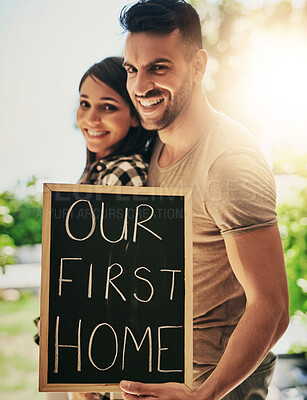 Buy stock photo Portrait of a young couple moving into a new place