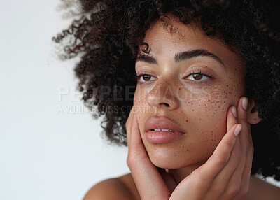 Woman, face and skincare or beauty in studio with freckles, dermatology and confidence. Model, person and serious with cosmetics, facial treatment and glowing skin with self care on white background