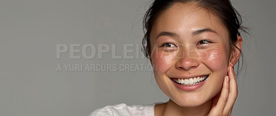 Smile, cosmetics or Asian woman with makeup, dermatology or wellness on grey studio background. Person, model or girl with healthy skin, glow or luxury with skincare or aesthetic with beauty or shine