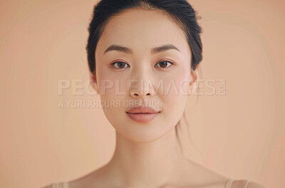 Beauty, makeup and portrait of happy asian woman in studio isolated on cream background. Face, skincare and relax with aesthetic, confident or natural young model at spa for cosmetics or dermatology