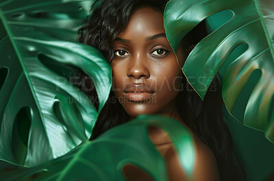 Buy stock photo Black woman, portrait and palm leaf for natural beauty, sustainable cosmetics and dermatology with nature. Tropical monstera, wellness and aesthetic for skincare, glow and eco friendly treatment