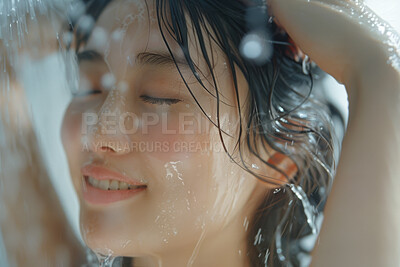 Asian woman, face and smile in shower with water for cleaning, washing and hygiene routine in bathroom. Person, splash and hair care for wellness, grooming and skincare with facial cleanse and happy