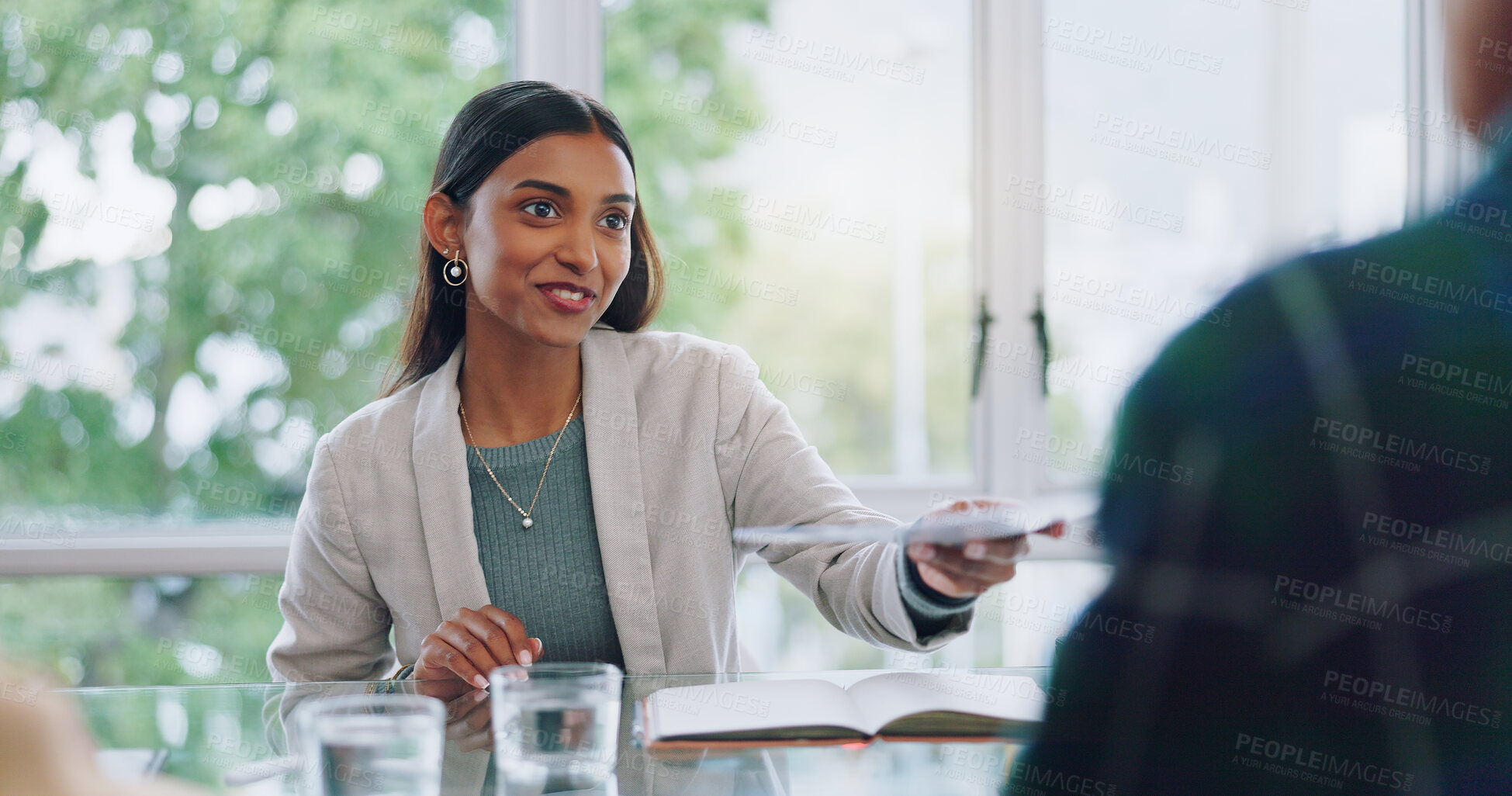 Buy stock photo Meeting, talking and a woman with a report for a manager, proposal and planning paperwork at work. Smile, business and a young corporate employee with a document for a boss during a collaboration or CV during interview