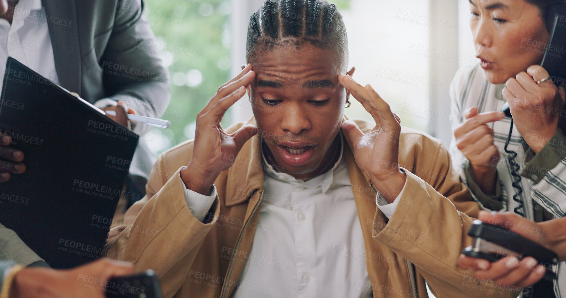 Buy stock photo Headache, stress and black man with office chaos, burnout and deadline pressure. Overwhelmed, anxiety and male manager with workload, accountability and mental health crisis by angry compliance team