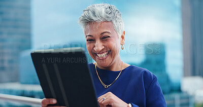 Mature, woman and laughing with tablet for business outdoor in city with corporate meme or social media joke. Senior, entrepreneur and comedy with technology for internet scroll and funny web search