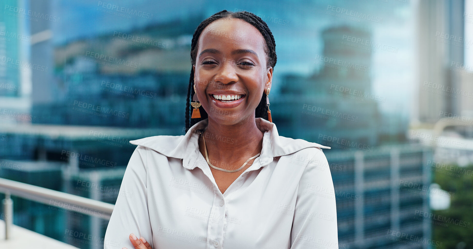 Buy stock photo Black woman, face and arms crossed, lawyer happy with career and confident on rooftop, skyscraper and pride. Expert, legal employee or attorney with smile in portrait for corporate and professional