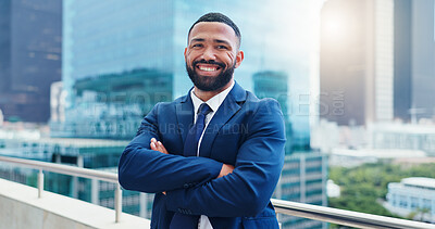Business man, face and arms crossed, lawyer happy with career and confident on rooftop, skyscraper and pride. Expert, legal employee or attorney with smile in portrait for corporate and professional
