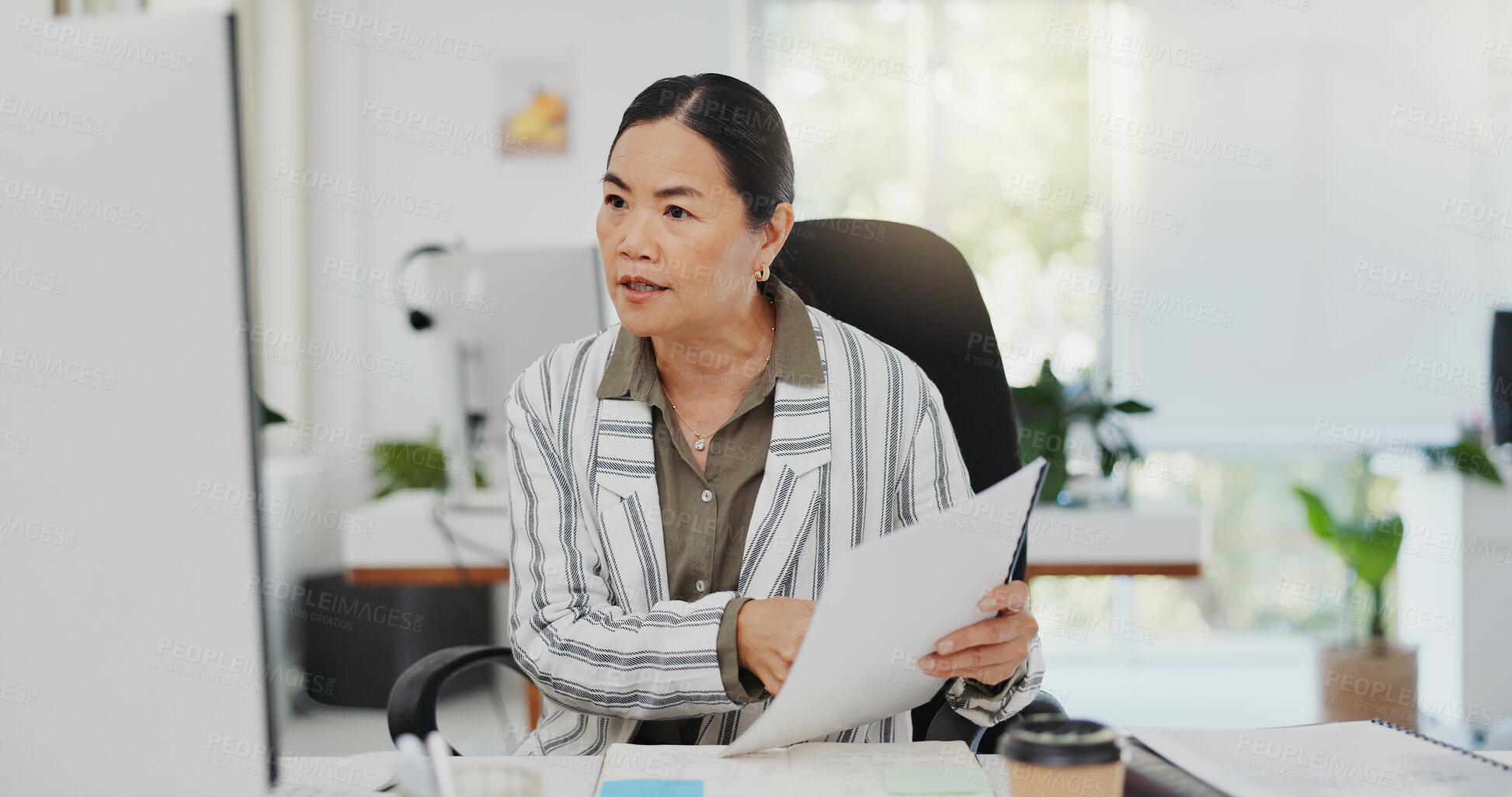 Buy stock photo Video call, advice and a woman with a computer and report for a consultation, service and web support. Help, Asian employee and speaking on a webinar or online meeting with documents for interview