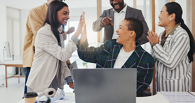Success, applause and a black woman with employees and a laptop, high five and celebration of achievement. Win, excited and an African worker with an online promotion, goal or support from team